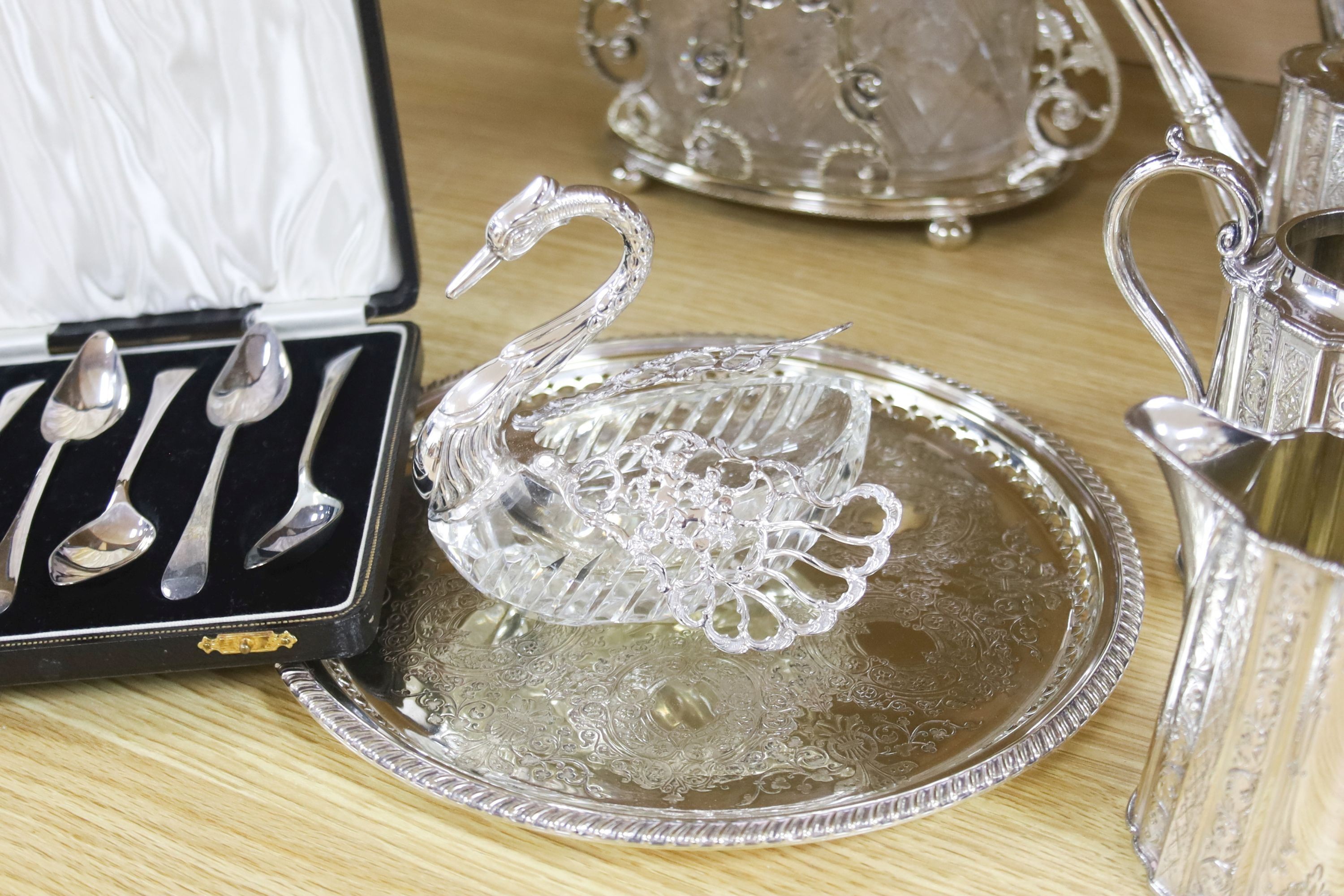 A Victorian cut glass and electroplate biscuit box and other plated wares